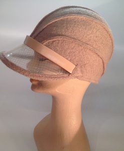 boiled wool cloche with plastic visor veil and leather applications - side view