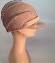 boiled wool cloche with plastic visor veil and leather applications – side view